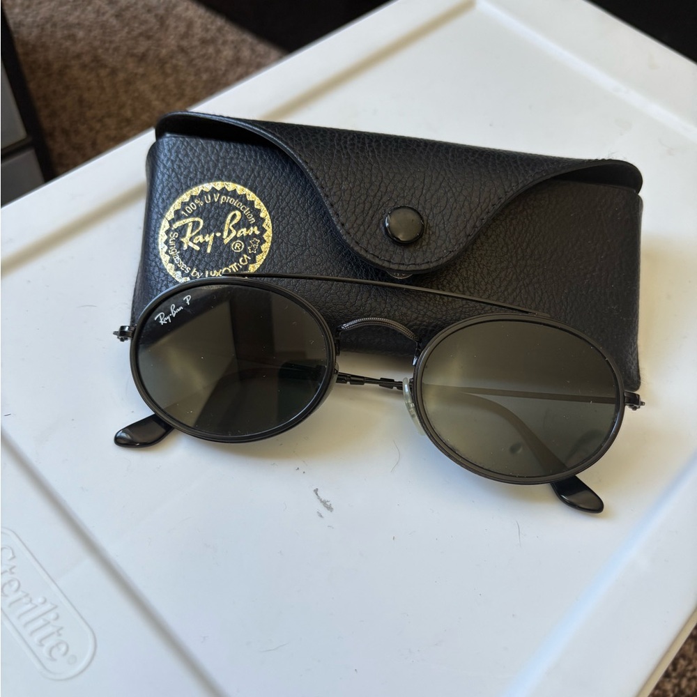 Ray-Ban Dark Oval Sunglasses with Case. Polarized